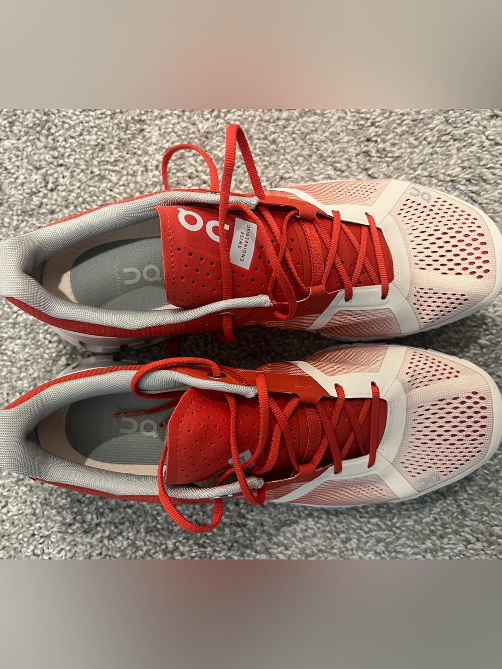 On Running Women’s Red and White Athletic Running Shoes